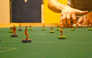 Rob tries to find his way past Steve's Toccer figures. Look at the size of those things!