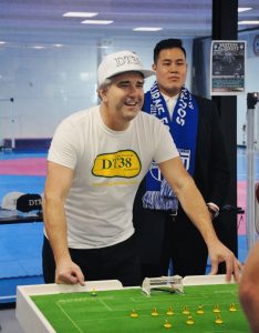 FFV President Kimon Taliadoris, prepares to take on Scott Jamieson in the Anzac Eve battle for testicular cancer awareness.